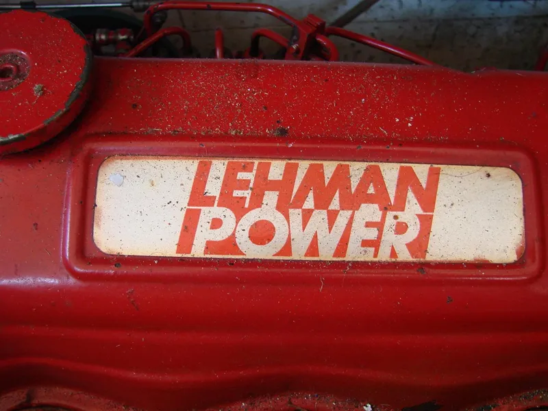 Slide: The Image of Close-up of a red Lehman Power engine with visible logo. - 37