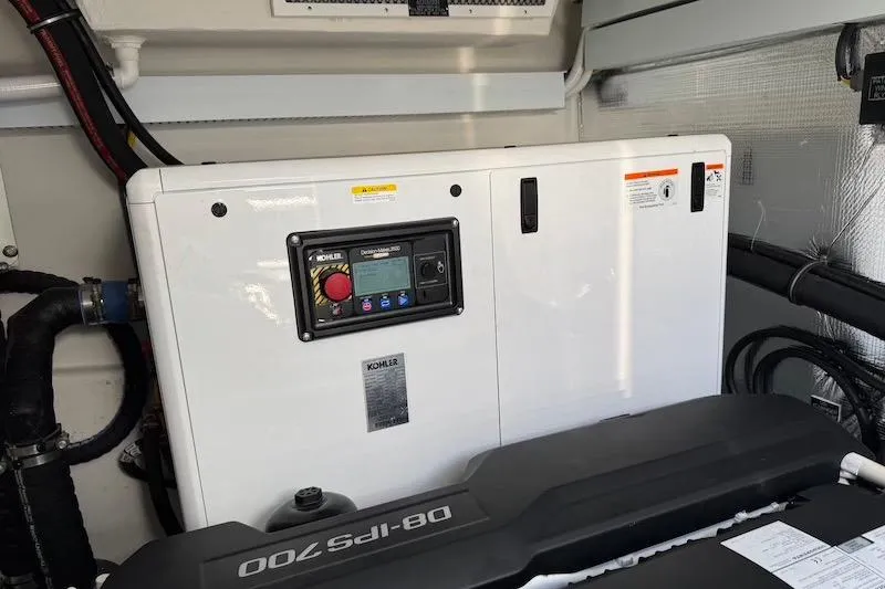 Slide: The Image of Engine room of 2023 Cruisers Yachts 50 Cantius with Kohler generator. - 59