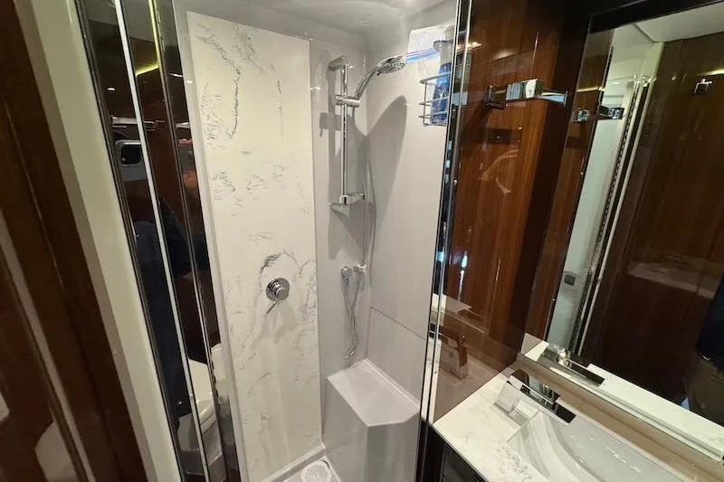 Slide: The Image of Luxurious bathroom in 2023 Cruisers Yachts 50 Cantius, featuring modern shower design. - 48