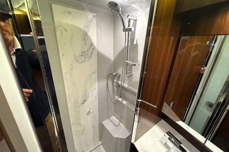 Slide: The Image of Luxurious shower area in 2023 Cruisers Yachts 50 Cantius, featuring modern fixtures and elegant design. - 44