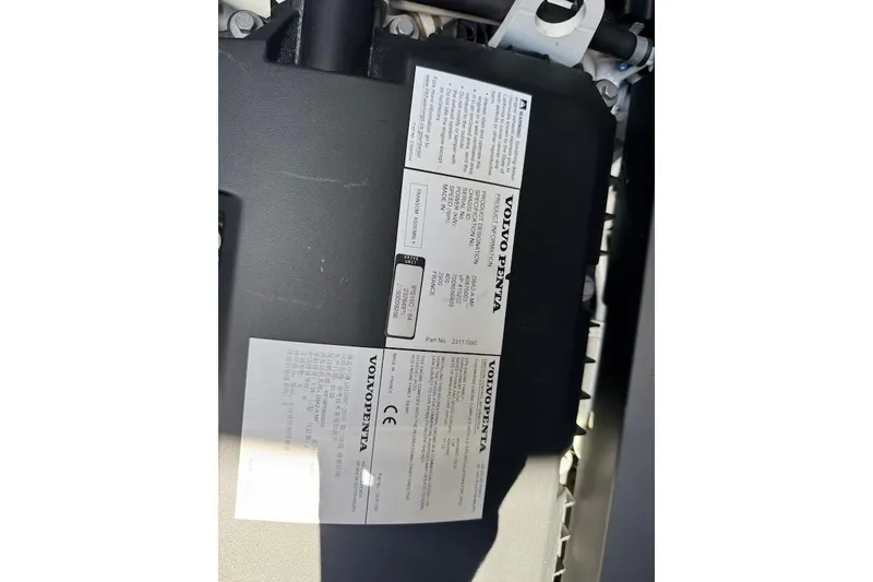 Slide: The Image of Engine label on 2023 Cruisers Yachts 50 Cantius, featuring Volvo Penta specifications. - 76