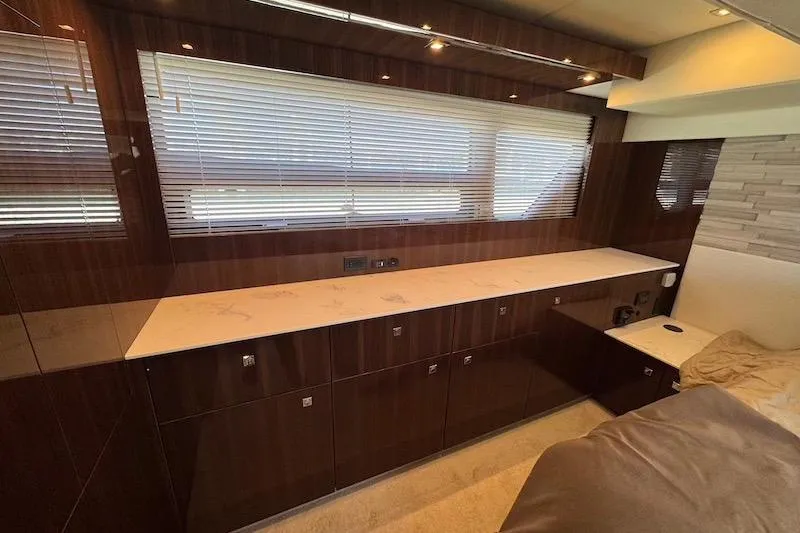 Slide: The Image of Luxurious interior of 2023 Cruisers Yachts 50 Cantius with sleek cabinetry and modern design. - 55