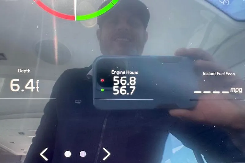 Slide: The Image of Display screen on 2023 Cruisers Yachts 50 Cantius showing depth and engine hours. - 29