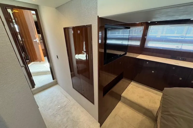 Slide: The Image of Luxurious interior of 2023 Cruisers Yachts 50 Cantius with modern furnishings and sleek design. - 50