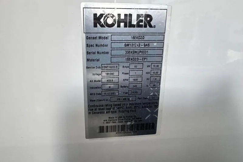 Slide: The Image of Kohler generator label on 2023 Cruisers Yachts 50 Cantius, model 16EKOZD, with specifications. - 60