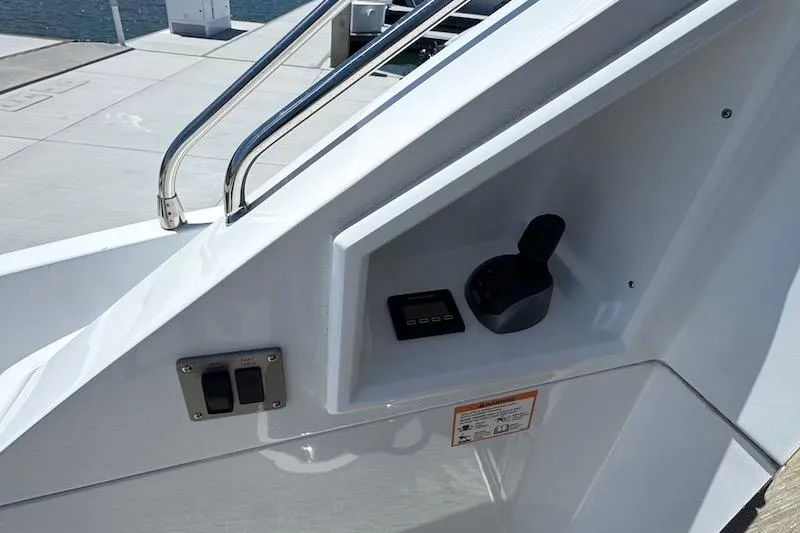 Slide: The Image of Control panel on 2023 Cruisers Yachts 50 Cantius, featuring sleek design and modern controls. - 8