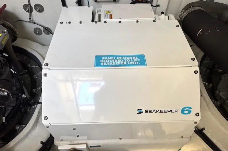 Slide: The Image of Seakeeper 6 stabilizer unit in 2023 Cruisers Yachts 50 Cantius engine room. - 64