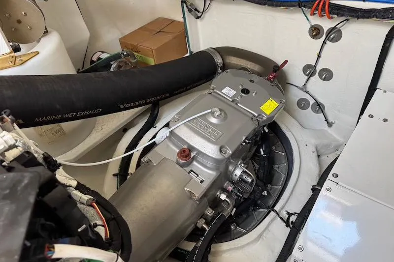 Slide: The Image of Engine compartment of 2023 Cruisers Yachts 50 Cantius, featuring Volvo Penta marine components. - 65