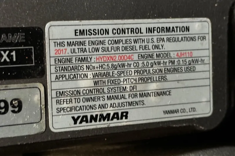 Slide: The Image of Emission control label on a 2018 Jeanneau 54 marine engine by Yanmar. - 113