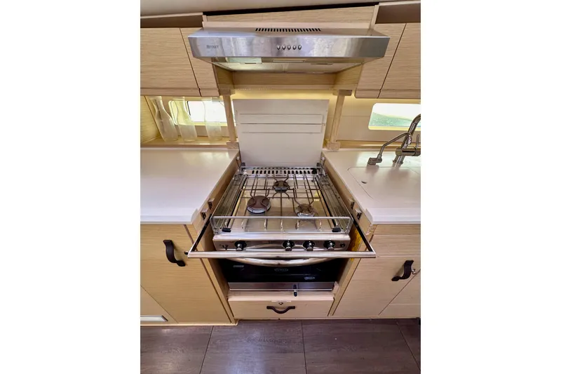 Slide: The Image of Modern kitchen in 2018 Jeanneau 54 yacht with stove and sink. - 93