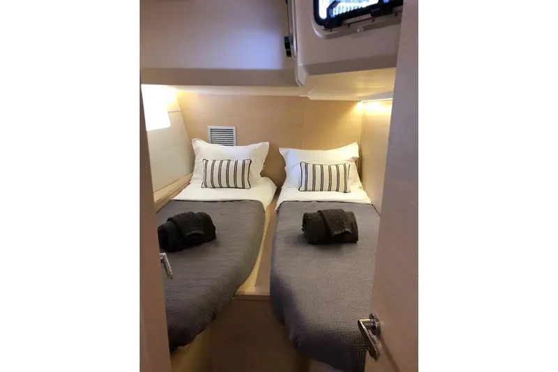Slide: The Image of Luxurious cabin interior of 2018 Jeanneau 54 yacht with twin beds and elegant decor. - 69
