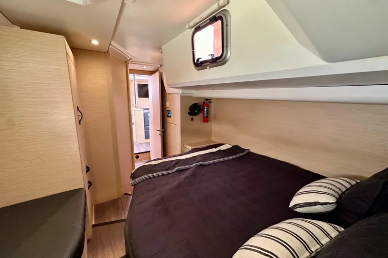 Slide: The Image of Luxurious cabin interior of 2018 Jeanneau 54 yacht with cozy bedding and modern design. - 80