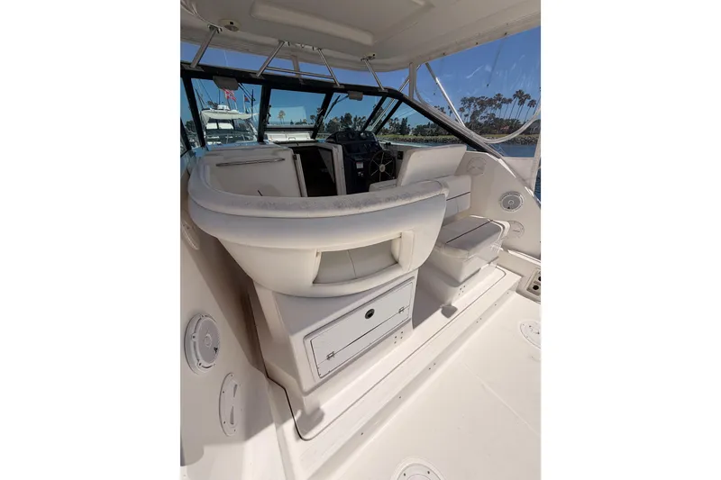 Slide: The Image of 2005 Tiara Yachts 2900 Open Classic interior with helm and seating area. - 26