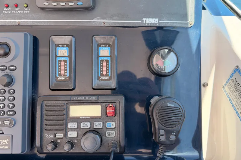 Slide: The Image of Control panel of a 2005 Tiara Yachts 2900 Open Classic with navigation and communication equipment. - 37