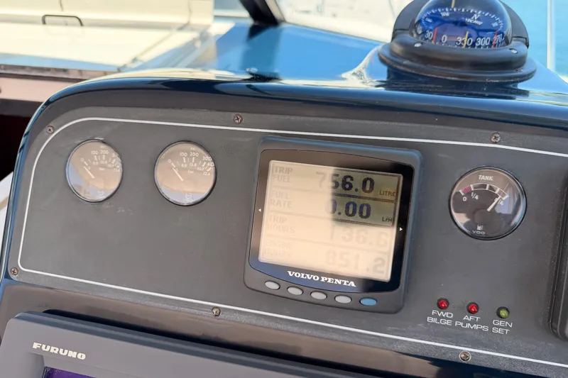 Slide: The Image of Dashboard of a 2005 Tiara Yachts 2900 Open Classic with Volvo Penta display. - 40