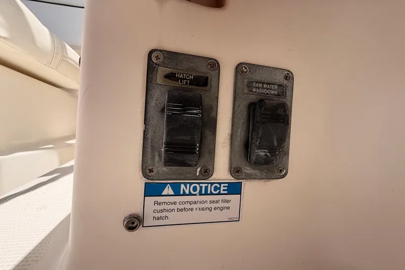 Slide: The Image of Controls on a 2005 Tiara Yachts 2900 Open Classic, featuring hatch lift and raw water washdown. - 16