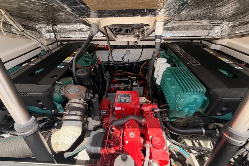 Slide: The Image of Engine compartment of a 2005 Tiara Yachts 2900 Open Classic, showcasing dual engines. - 78