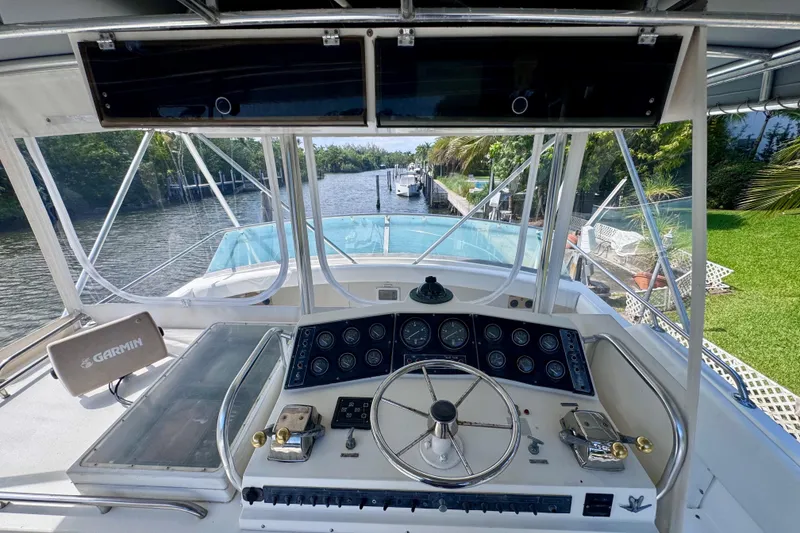 Slide: The Image of Cockpit view of a 1986 Bertram 46III Convertible yacht with Garmin navigation system. - 14