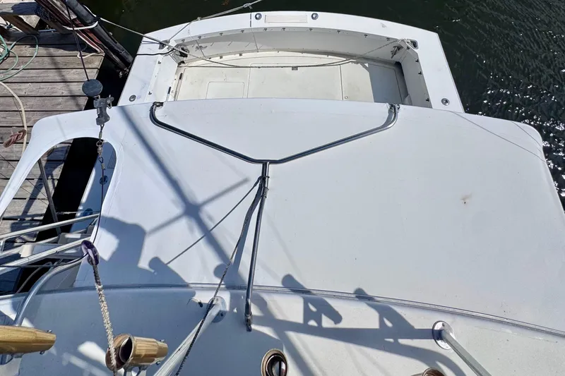 Slide: The Image of 1986 Bertram 46III Convertible boat deck view at dockside. - 24
