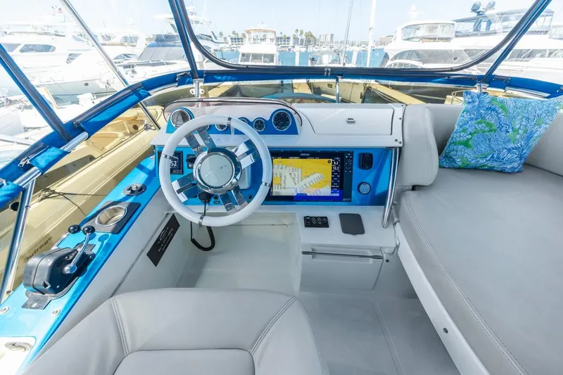 Slide: The Image of Helm of 2006 Azimut 43 yacht with navigation system and blue accents. - 15