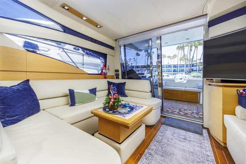 Slide: The Image of Luxurious interior of a 2006 Azimut 43 yacht with elegant seating and decor. - 37