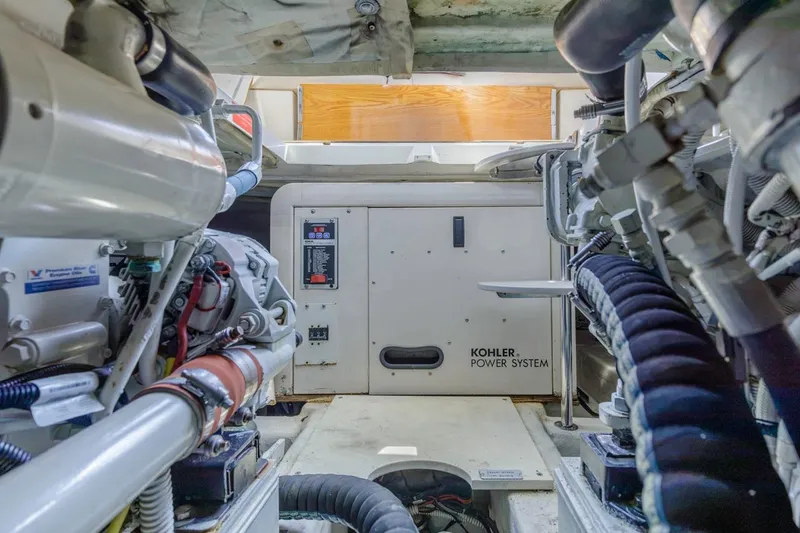 Slide: The Image of Engine room of a 2006 Azimut 43 yacht featuring Kohler power system. - 44
