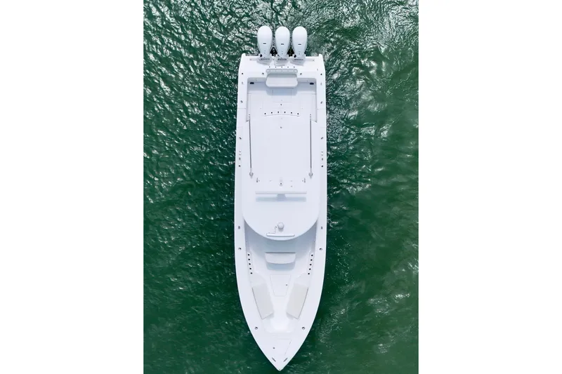 Slide: The Image of Aerial view of 2023 Jupiter 43 boat on green water. - 5