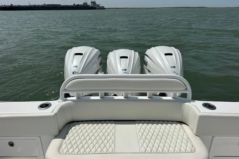 Slide: The Image of Luxury Jupiter 43 boat with triple V8 engines on open water, 2023 model. - 12