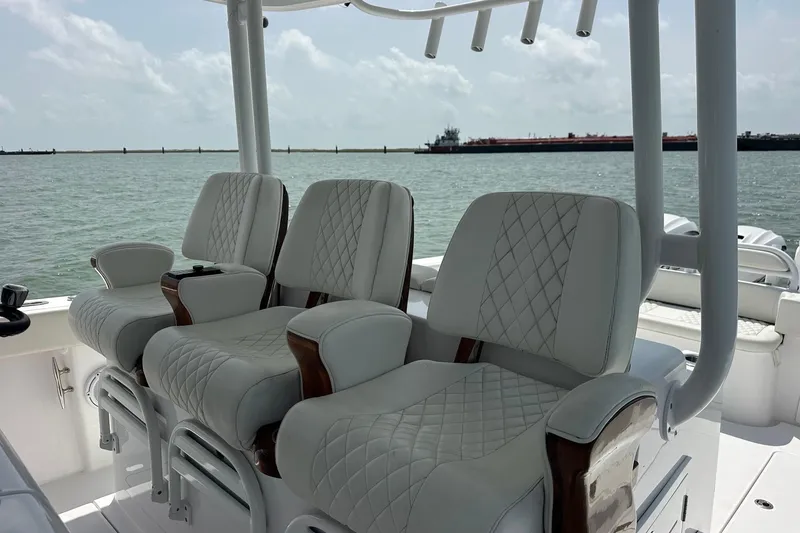 Slide: The Image of Luxurious seating on a 2023 Jupiter 43 boat with ocean view. - 10