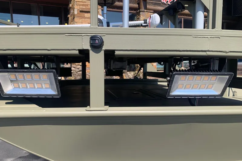 Slide: The Image of 2026 Tracker Grizzly 2072 CC Sportsman boat with mounted LED lights. - 4