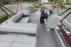 Slide: The Image of 2026 Ranger 220F boat interior with spacious seating and modern steering console. - 9