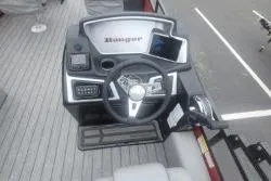 Slide: The Image of 2026 Ranger 220F boat dashboard with steering wheel and electronic controls. - 5