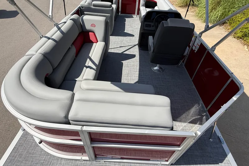 Slide: The Image of 2026 Sun Tracker Party Barge 20 DLX with spacious seating and modern interior design. - 7