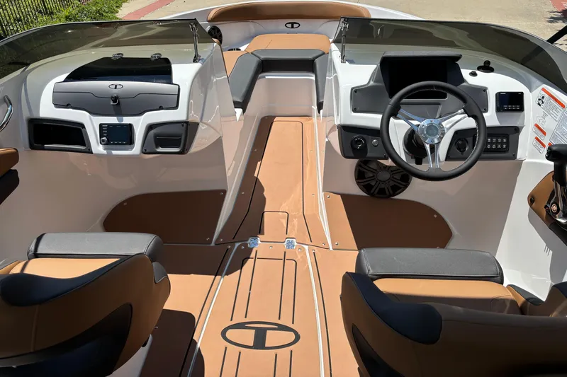 Slide: The Image of Interior of 2026 Tahoe 210 S boat, featuring sleek design and modern controls. - 7
