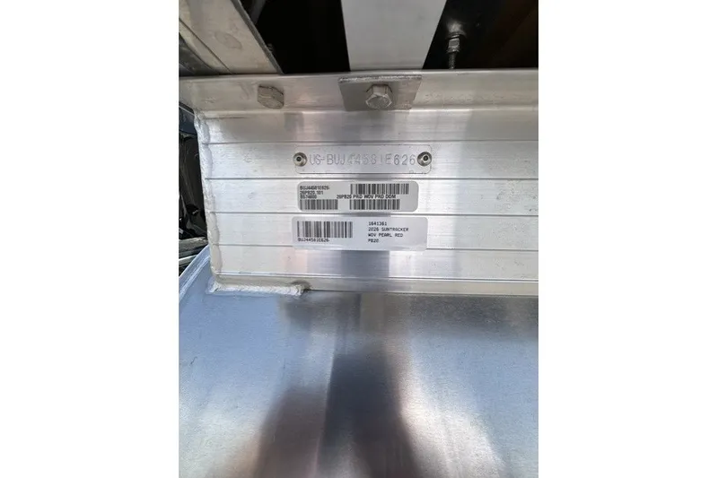 Slide: The Image of Close-up of a boat part with serial number and barcode. - 19