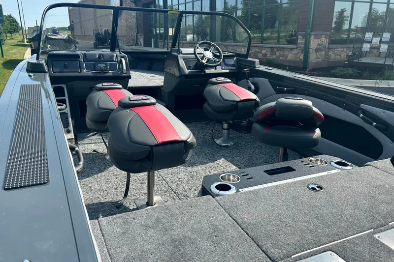 Slide: The Image of 2026 Ranger VX1988 WT boat interior with modern seating and steering console. - 11