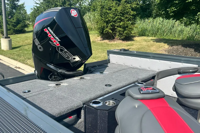 Slide: The Image of 2026 Ranger VX1988 WT boat with Mercury Pro XS engine, parked outdoors. - 6
