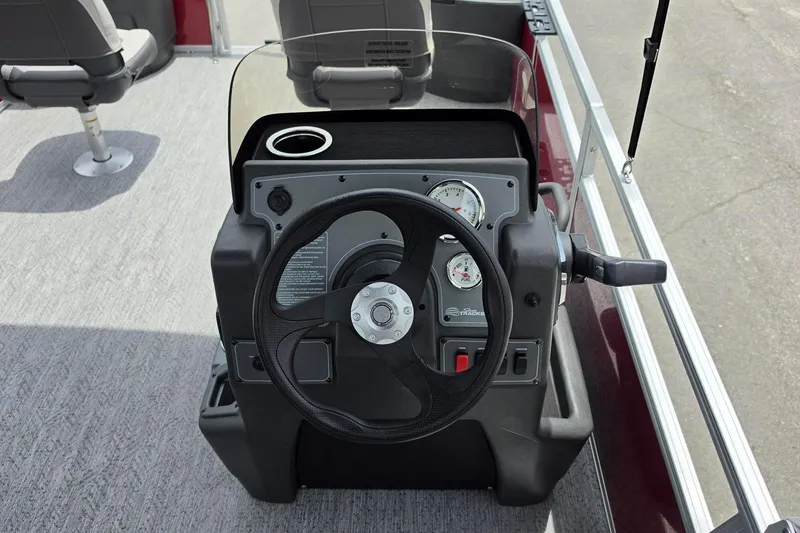 Slide: The Image of Steering console of 2026 Sun Tracker Bass Buggy 18 DLX pontoon boat. - 14