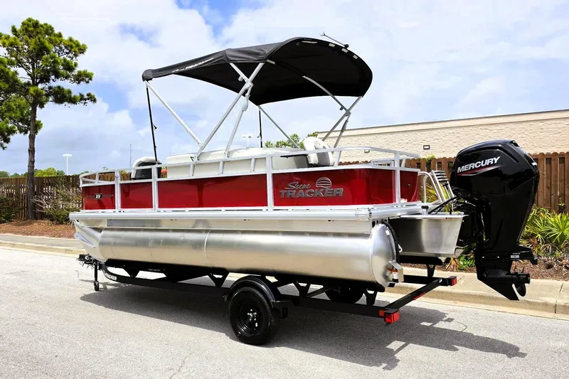 Slide: The Image of 2026 Sun Tracker Bass Buggy 18 DLX pontoon boat with Mercury outboard motor. - 11