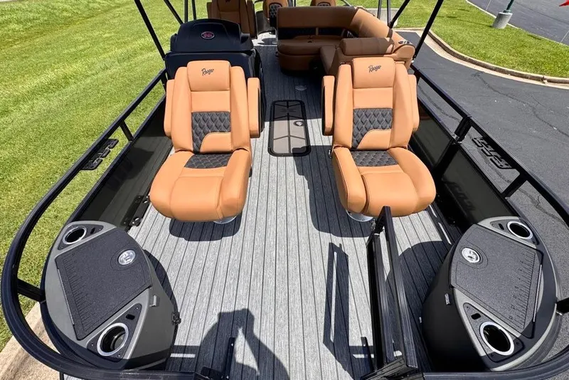 Slide: The Image of 2026 Ranger 223F boat interior with tan seats and sleek design. - 10