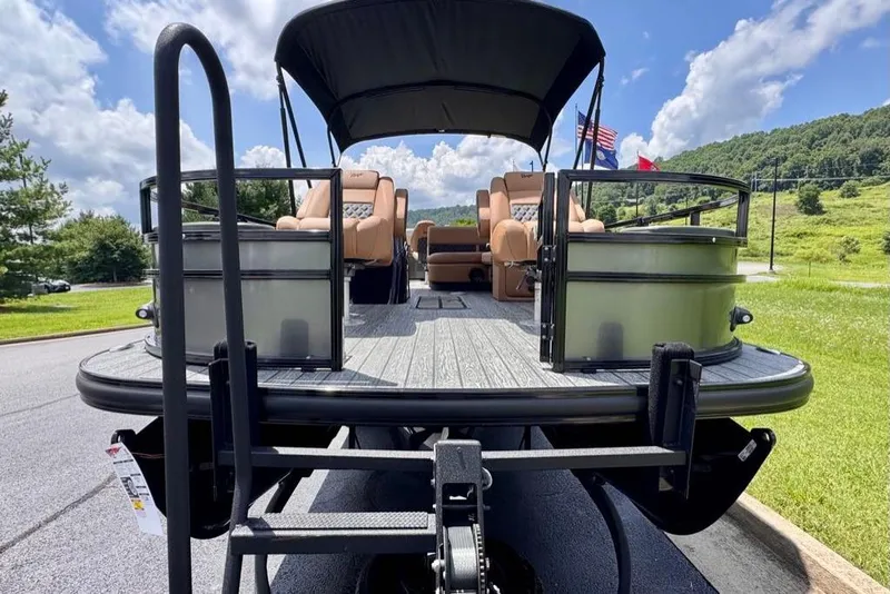 Slide: The Image of 2026 Ranger 223F pontoon boat with seating, docked on a sunny day. - 5