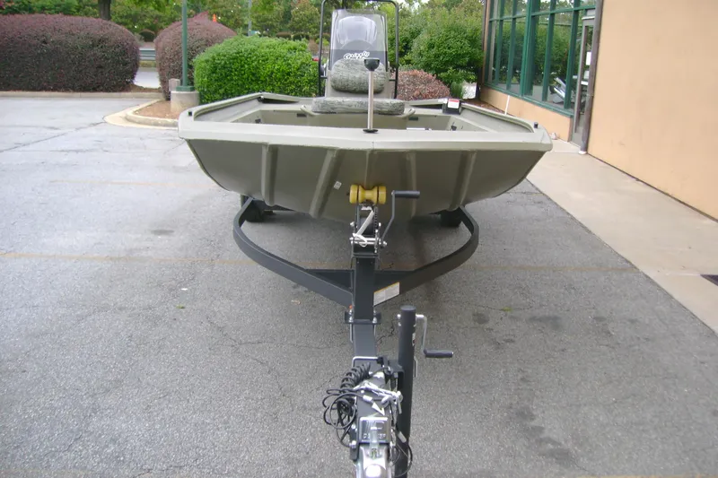 Slide: The Image of 2026 Tracker Grizzly 1860 CC boat on trailer in parking lot. - 7