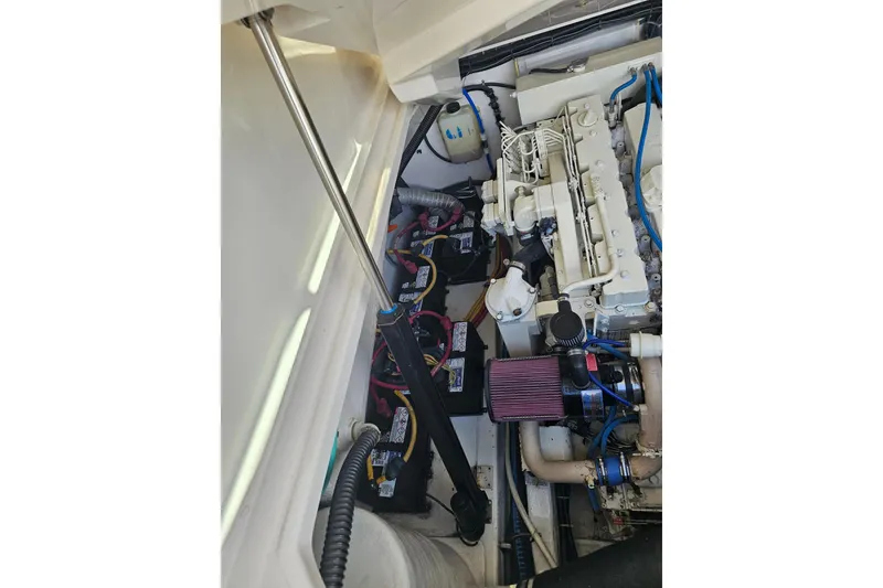 Slide: The Image of Engine compartment of a 2003 Tiara Yachts 3800 Open, showcasing mechanical components. - 15