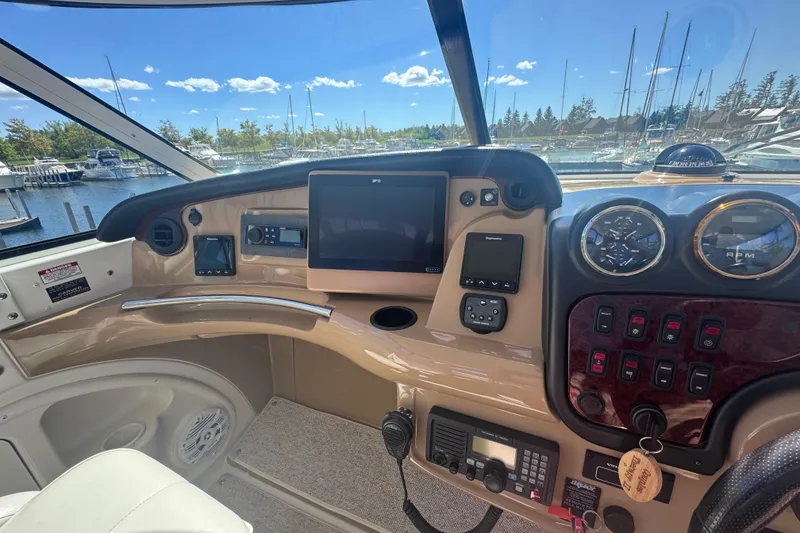 Slide: The Image of Interior helm of 2004 Carver 466 Motor Yacht with navigation instruments and controls. - 7