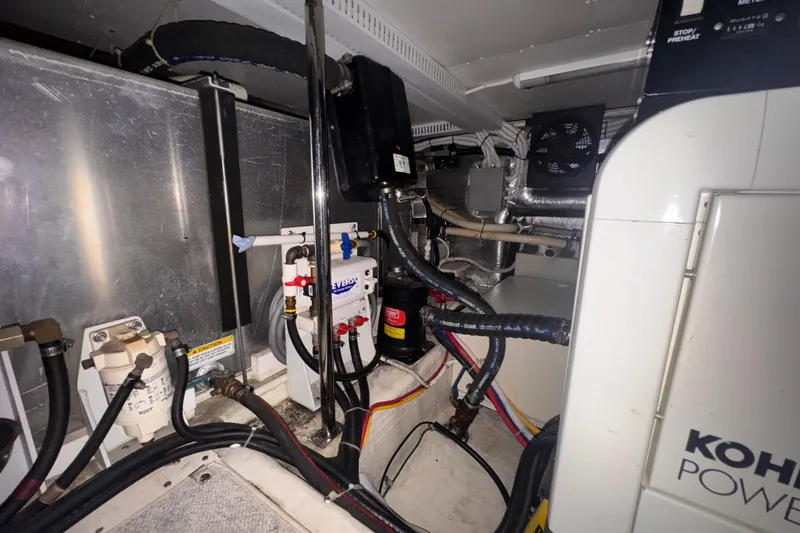 Slide: The Image of Engine room of a 2004 Carver 466 Motor Yacht with Kohler power system. - 51