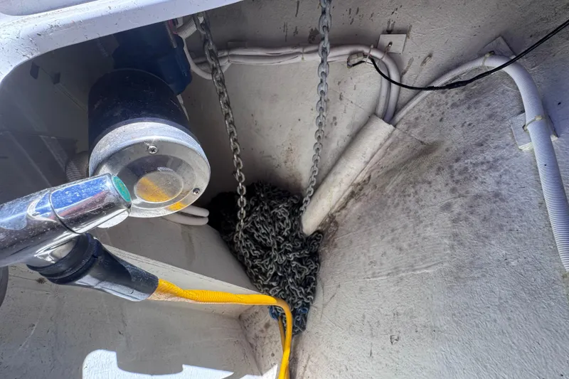 Slide: The Image of Anchor chain and winch system on a 2004 Carver 466 Motor Yacht. - 41