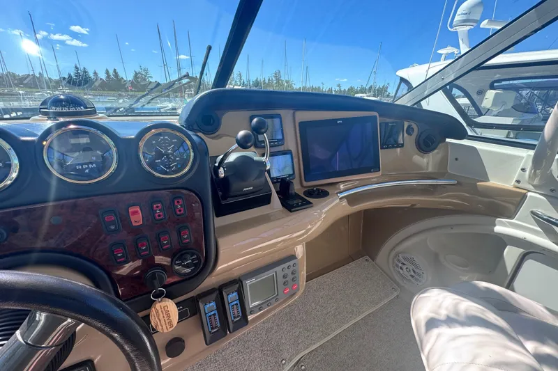 Slide: The Image of Helm of 2004 Carver 466 Motor Yacht with navigation instruments and controls. - 8