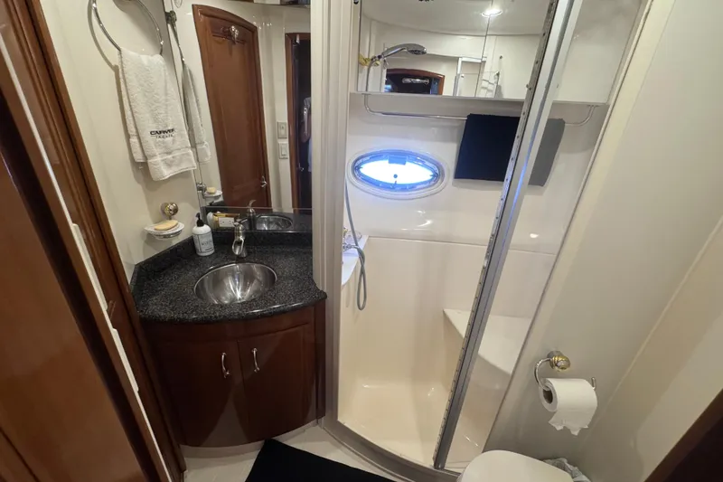 Slide: The Image of Luxurious bathroom in 2004 Carver 466 Motor Yacht with shower and vanity. - 33