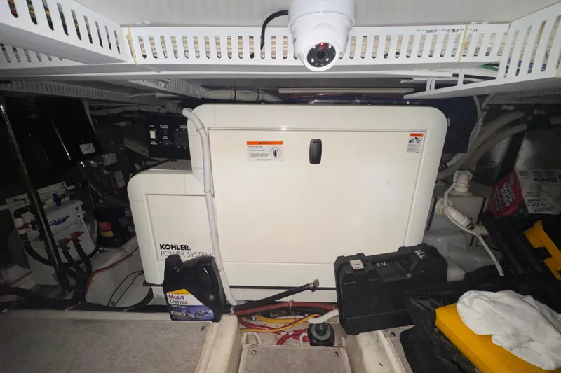 Slide: The Image of Engine room of 2004 Carver 466 Motor Yacht with Kohler power system. - 49