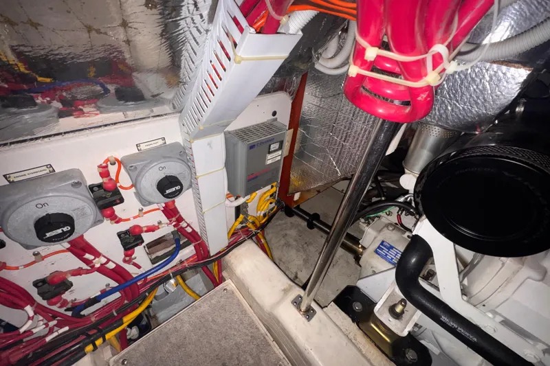 Slide: The Image of Engine room of 2004 Carver 466 Motor Yacht with electrical components and wiring. - 53